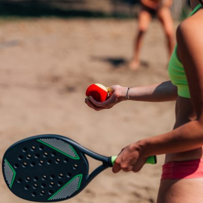 Female Team Playing Beach Tennis